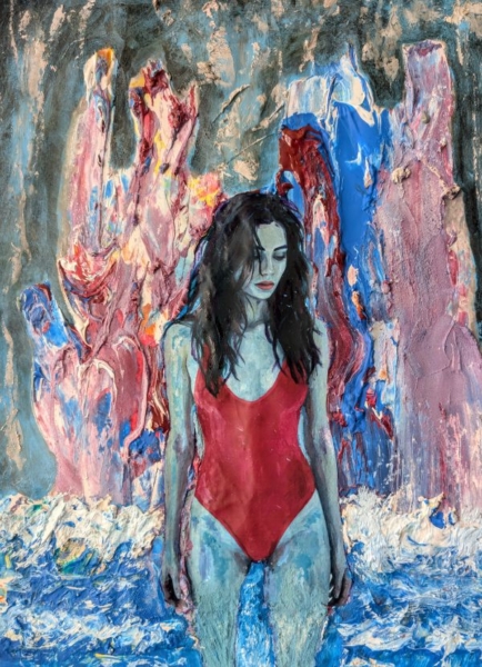 A woman in a red swimsuit stands waist-deep in textured, abstract waves of blue and white, against a backdrop of layered, painterly cliffs in red, blue, and violet tones.