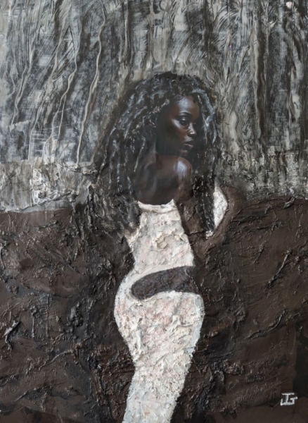 Woman walking out of rough terrain.